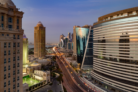 A skyline view of Doha City Centre at dusk. Doha, Qatarのeditorial素材