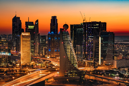 A beautiful Skyline view of Dubai, UAE as seen from Dubai Frame at sunset showing World Trade Centre, H Hotel, Fairmont, Conrad and Etisalat Towerのeditorial素材
