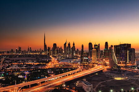 A beautiful Skyline view of Dubai, UAE as seen from Dubai Frame at sunset showing Burj Khalifa, Emirates Towers, Index Building, DIFC, World Trade Centre, H Hotel, Conrad and Etisalat Towerのeditorial素材