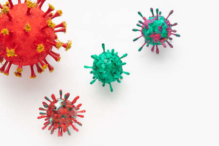 A photograph of a collection of four colorful 3D Virus artwork model forms. Inspired by the Covid-19 lockdown of 2020の写真素材