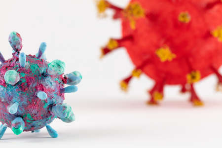 A photograph of two colorful 3D Virus artwork model forms. Inspired by the Covid-19 lockdown of 2020の写真素材