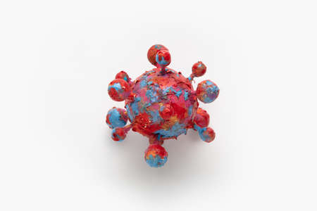A photograph of a colorful virus sculpture. The artwork inspired by the Covid-19 lockdown of 2020の写真素材