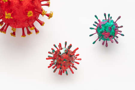 A photograph of a collection of three colorful 3D Virus artwork model forms. Inspired by the Covid-19 lockdown of 2020の写真素材