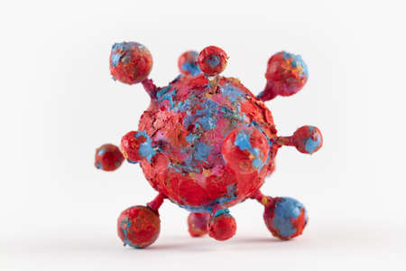 A photograph of a colorful virus sculpture. The artwork inspired by the Covid-19 lockdown of 2020の写真素材