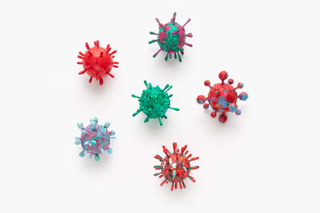 A photograph of a collection of six colorful 3D Virus artwork model forms. Inspired by the Covid-19...