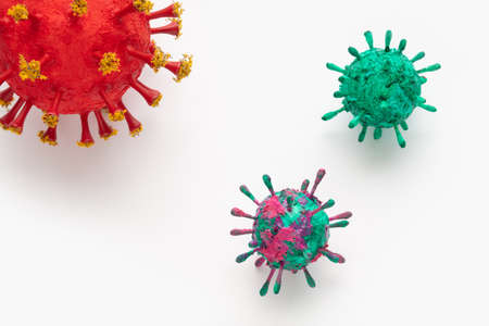 A photograph of a collection of three colorful 3D Virus artwork model forms. Inspired by the Covid-19 lockdown of 2020の写真素材