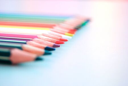 Color pencils isolated on white background close up. Art, hobbies, drawing and school toolsの写真素材