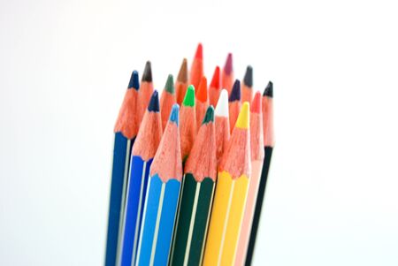 Color pencils isolated on white background close up. Art, hobbies, drawing and school toolsの写真素材