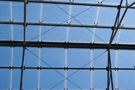 Glass windows with a blue sky on a summer day.の写真素材
