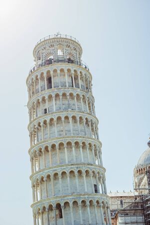 The Pisa tower, we have sunny summer day. Torre di Pisa, the campanile of the Cathedral of Our Lady of the Assumption, in Tuscanyの写真素材