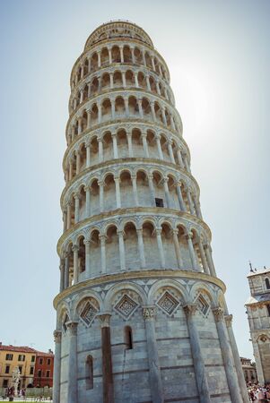 The Pisa tower, we have sunny summer day. Torre di Pisa, the campanile of the Cathedral of Our Lady of the Assumption, in Tuscanyの写真素材