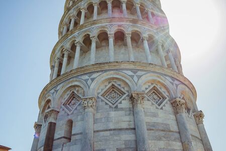 The Pisa tower, we have sunny summer day. Torre di Pisa, the campanile of the Cathedral of Our Lady of the Assumption, in Tuscany. Close up.の写真素材
