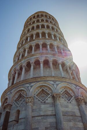 The Pisa tower, we have sunny summer day. Torre di Pisa, the campanile of the Cathedral of Our Lady of the Assumption, in Tuscanyの写真素材