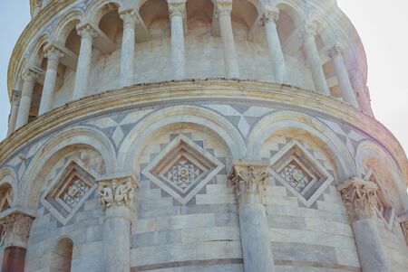 The Pisa tower, we have sunny summer day. Torre di Pisa, the campanile of the Cathedral of Our Lady of the Assumption, in Tuscany. Close up.の写真素材