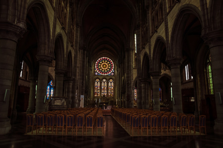St. Martin's Church in Arlon, Province of Luxembourg, Belgium. View of the interior, Neo-Gothic style, Wallonia's major heritage. With its pretty stained glass windows and central aisleのeditorial素材