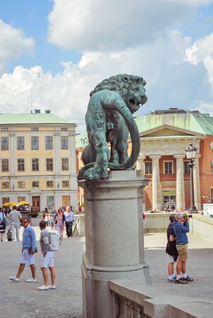 Stockholm, Sweden - August 5 2012: lion statue in front of the Royal Palace at Stadsholmen in Gamla Stan, Kungliga slottenのeditorial素材