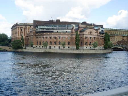 Stockholm, Sweden - August 5 2012: Riksdagshuset, seat of the Swedish Parliament, on Helgeandsholmen islet in the historic part of the cityのeditorial素材