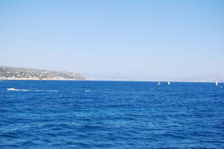Beautiful view of the sea with the horizon and mountainous rocks in Provence, Marseilleの写真素材