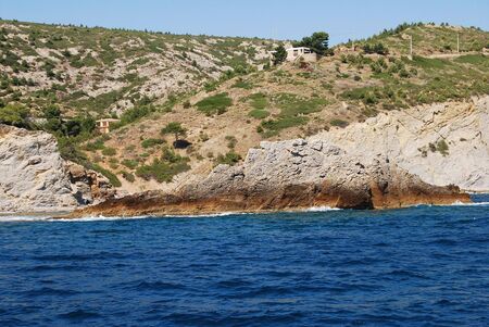 Beautiful view of the sea with the horizon and mountainous rocks in Provence, Marseilleの写真素材