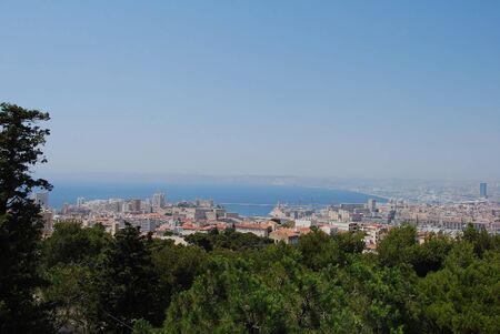 View of the city of Marseille, Provence, from the Basilique Notre-Dame de la Garde / The Basilica of Our Lady of the Guard. Beautiful panorama cityscapeの写真素材