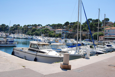 Marseille, France - July 6 2011: Pretty harbor with boats and view on the sea side and the city in Provenceのeditorial素材
