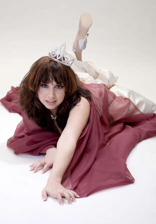 Beauty or prom queen takes a fallの写真素材