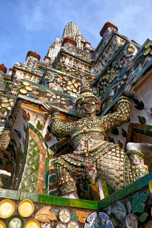 Colorful Ceramic Giant Warrior of Central Pagoda at Wat Arun the Temple of Dawn in Bangkok, One of oldest temples in Thailand.の写真素材