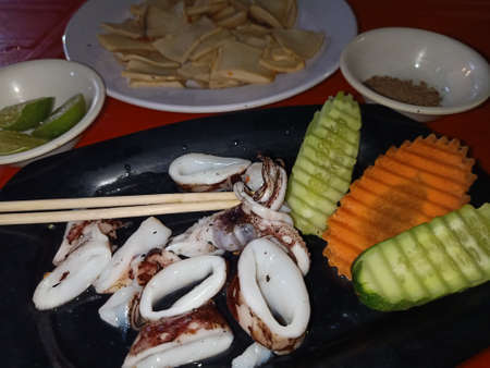 Grilled seafood and mushrooms - eaten in a street restaurant.