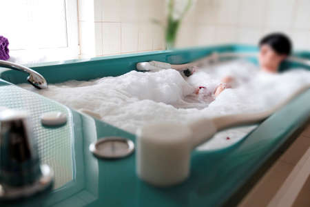 Hydromassage at the SPA. A relaxing massage using water under different pressure and temperature.の写真素材