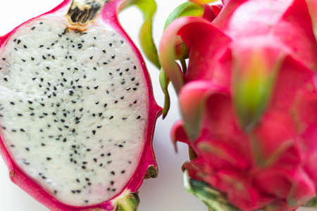 Red and White Dragon fruit. Whole fruits and their cross-section. 
Other names for the fruit are:...
