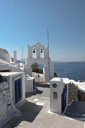 Campanile in Oia on Santorini island in the Cyclades (Greece)の写真素材