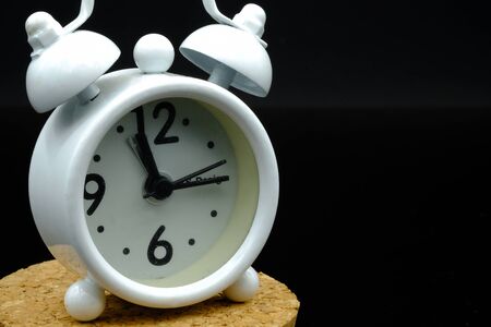 a simple tiny watch with white faceの写真素材