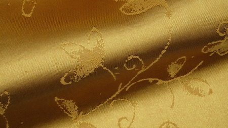 ripple golden fabric with natural patternの写真素材