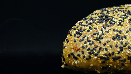 a loaf of cranberry, pine ,sunflower, wheat  bread with black and white sesameの写真素材