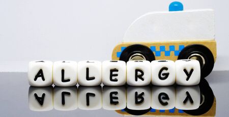 alphabet letters spelling a word 'Allergy', a condition demands urgent medical evaluation and treatmentの写真素材