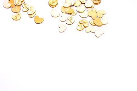 love letters engraved on heart shaped wood on white backgroundの写真素材