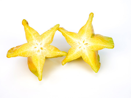sliced star fruits (carumbola) isolated on white background