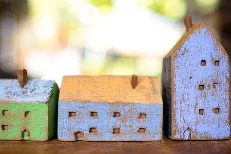 Closed up of colorful small painted wooden house models.の写真素材