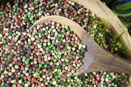 Four color of pepper: black, white, green and pinkの写真素材