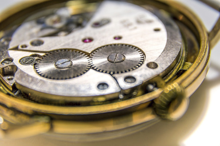 Close up of golden, antique watch mechanismの写真素材