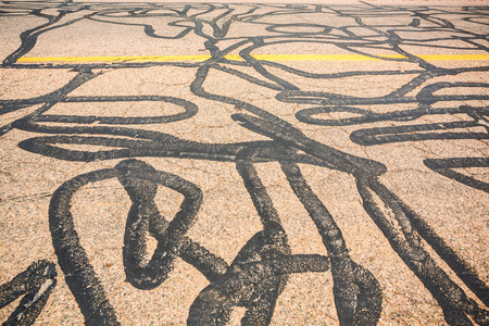 Road many times fixed with tarの写真素材