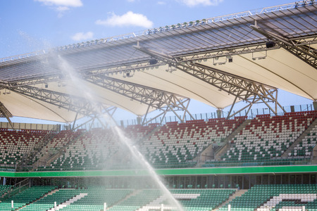 Watering grass on big sport stadium, Warsaw, Polandのeditorial素材