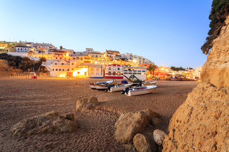 Beautiful beach with boats in Carvoeiro, Algarve, Portugalの写真素材