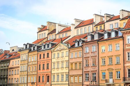Beautiful colorful tenements in the city center of Warsaw, Poland, Europeの写真素材