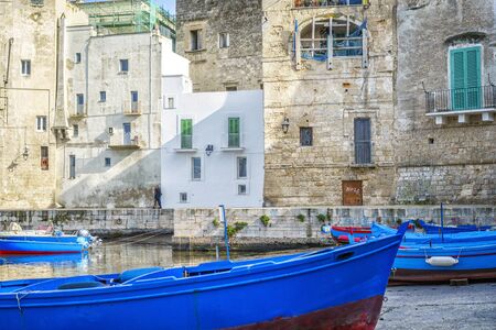 Blue boats in seaport of Monopoli, Apulia, Italyの写真素材