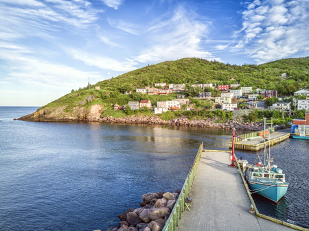 Beutiful Petty Harbour with two piers during summer sunset, Newfoundland and Labrador, Canadaのeditorial素材