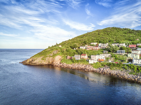 Small, wooden houses in hilly Petty Harbour, Newfoundland and Labrador, Canadaのeditorial素材