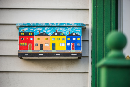 Colorful mailbox with wooden traditional houses in St. Johns, New Foundland, Canada