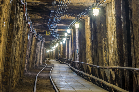 Illuminated underground tunnel in old, salt mine in Bochnia, Polandのeditorial素材