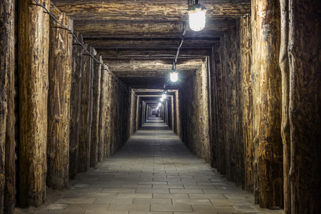 Illuminated underground tunnel in old, salt mine in Bochnia, Polandのeditorial素材